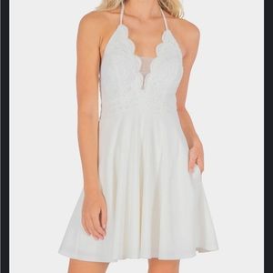 Beautiful white women’s bridal dress for shower wedding or bachelorette party